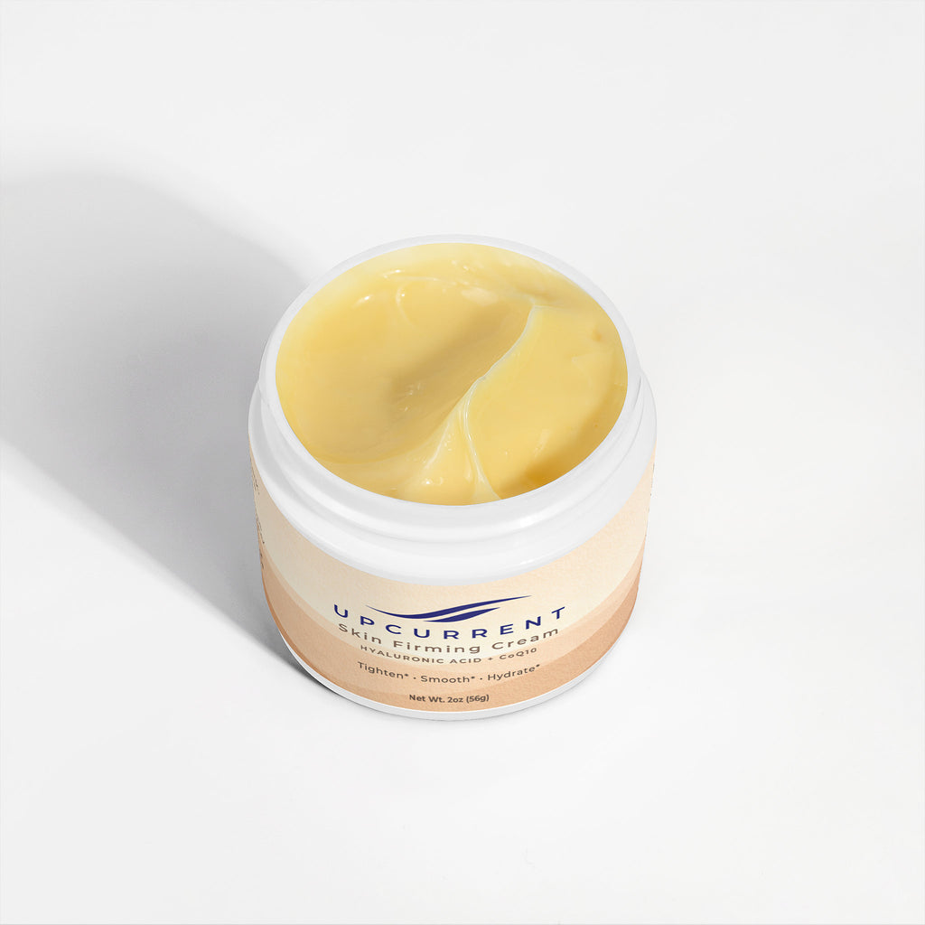 Jar of skincare cream with visible brand name on a white background