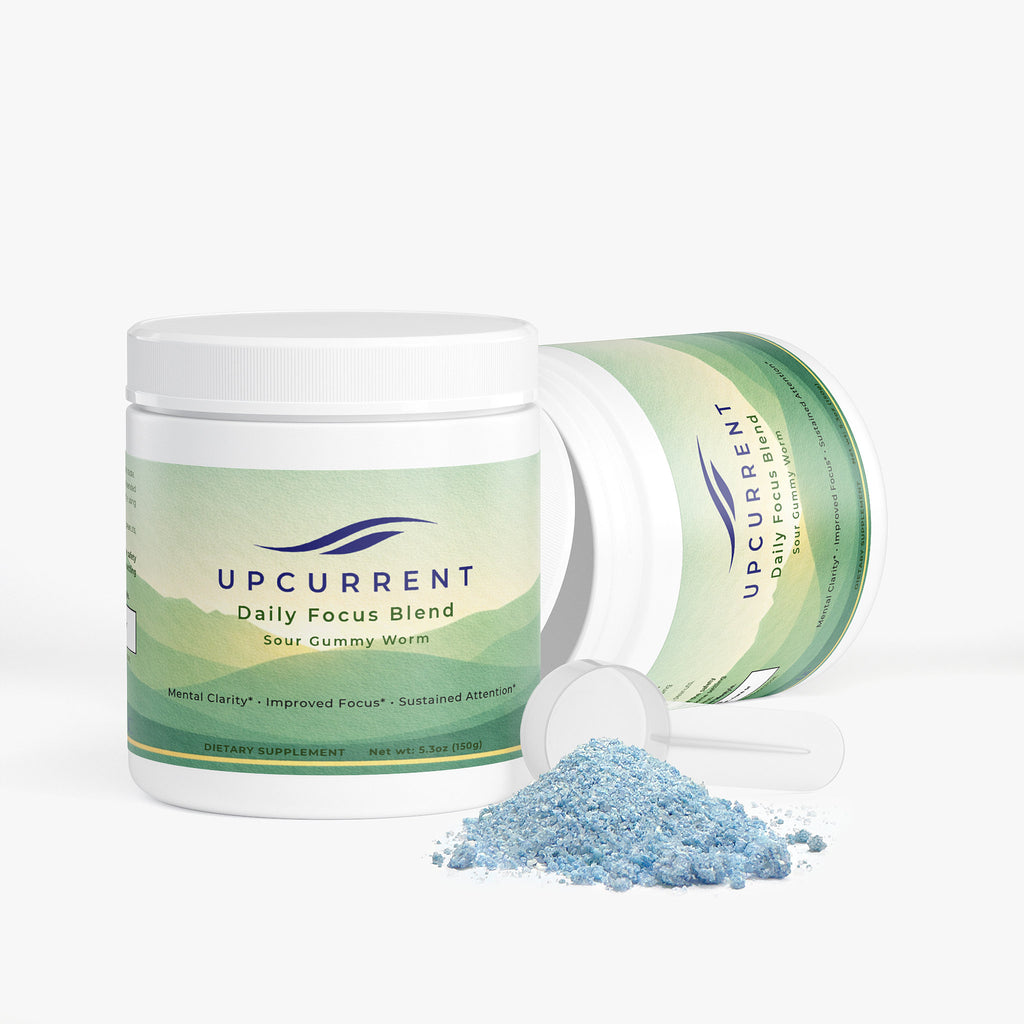 Upcurrent Daily Focus Blend container with blue powder on a white background