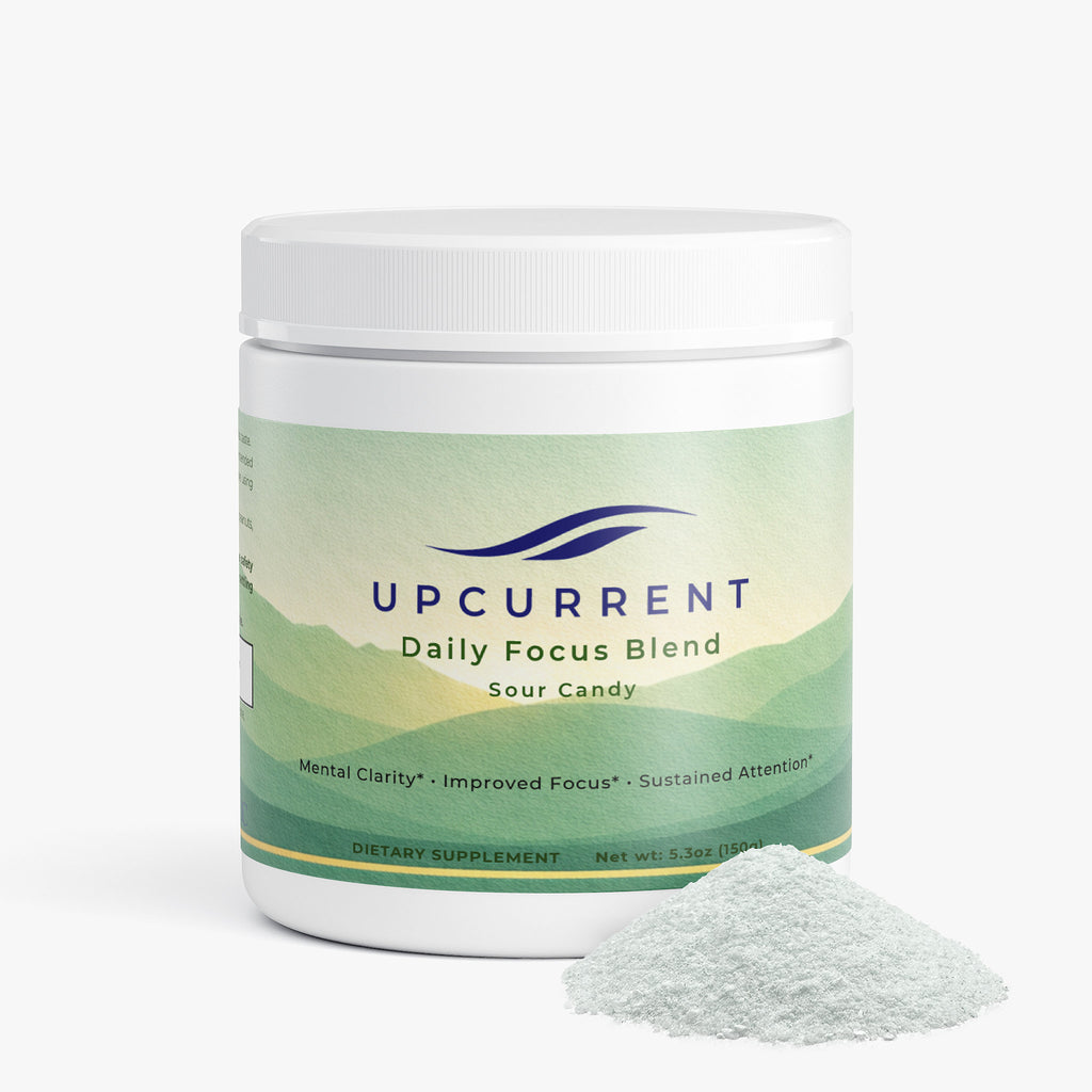 Upcurrent Daily Focus Blend supplement container with powder on a white background
