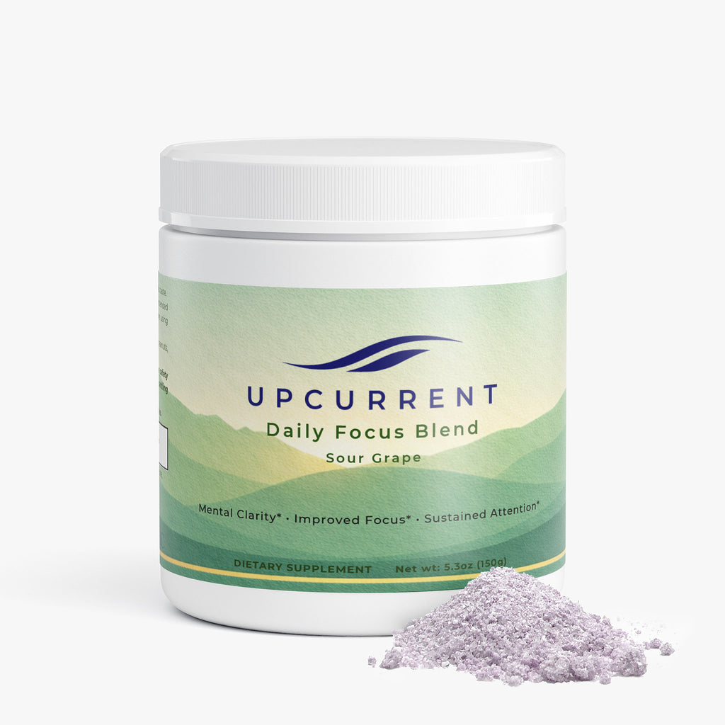 Upcurrent Daily Focus Blend container with purple powder on a white background