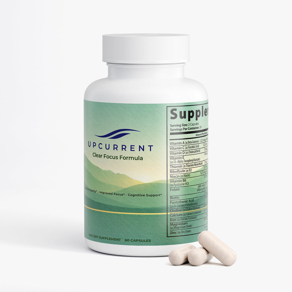Supplement bottle labeled 'Upcurrent Clear Focus Formula' with pills on a white background