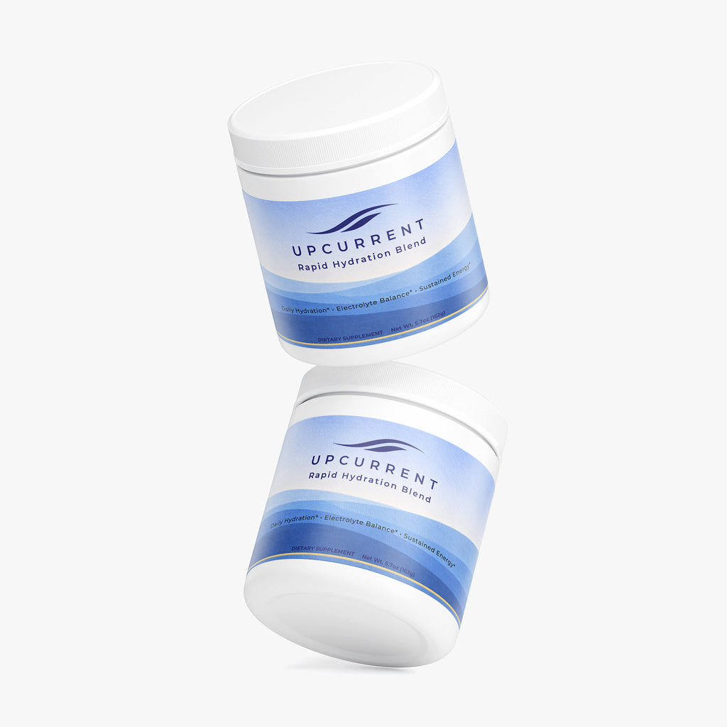 Two containers of Upcurrent Hydration Blend on a white background