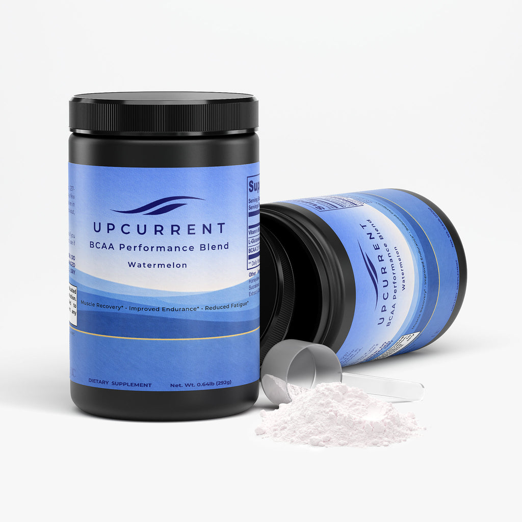 Upcurrent BCAA Performance Blend supplement container with scoop on a white background