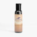 Bottle of Upcurrent Charcoal Facial Cleanser with Aloe Vera on a white background